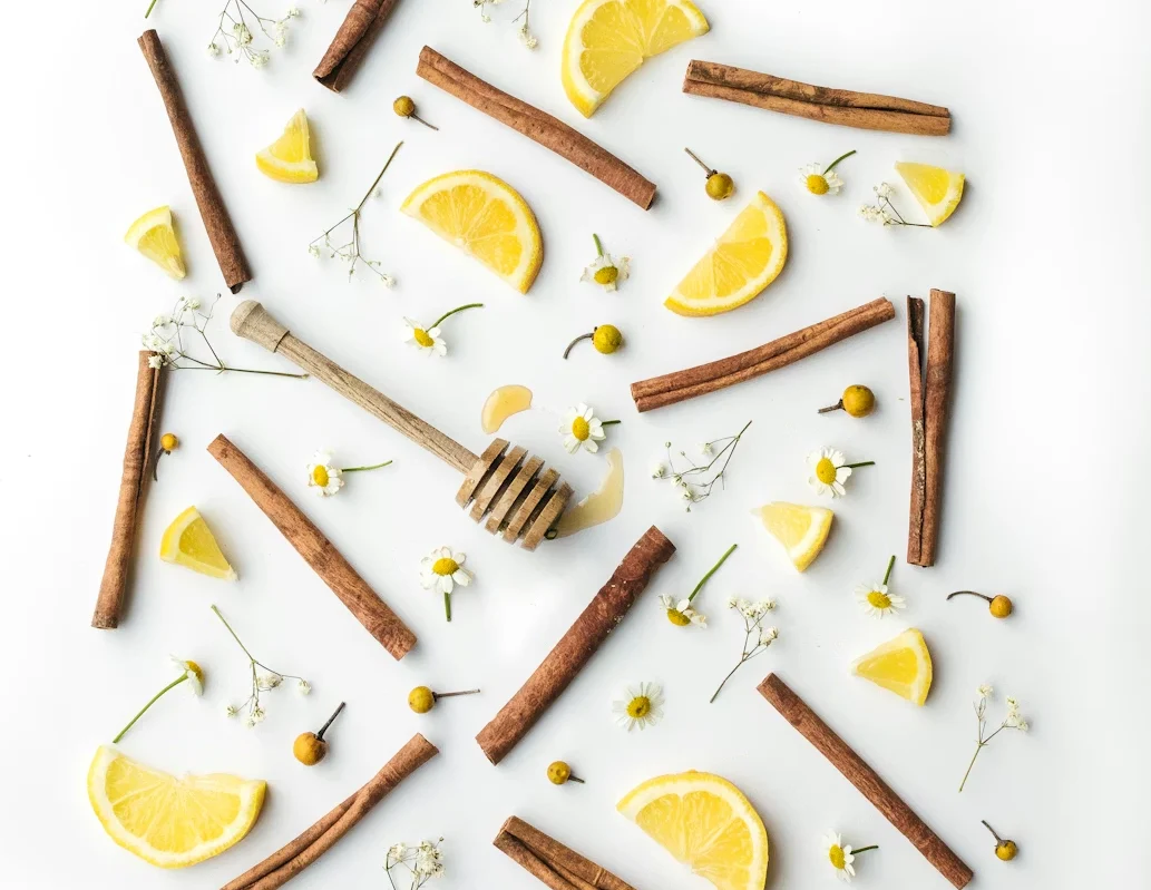 Natural cold relief remedies including eucalyptus, menthol and camphor on a wooden table